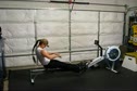 CrossFit Fishers: Pam knocking out 500m Rows and air squats